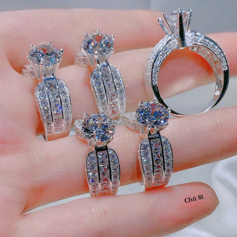 Set of diamond rings on a hand with a blurred background