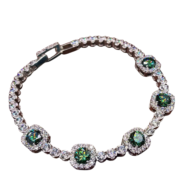 Bracelet with green gemstones and clear stones on a white background