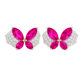 Butterfly-shaped earrings with pink gemstones and silver accents on a white background