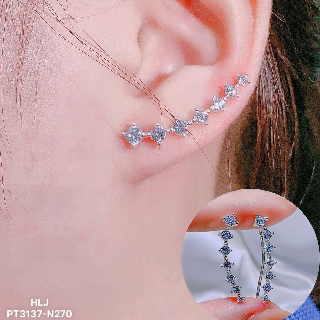 Close-up of an ear wearing a silver earring with gemstones, inset showing the earring in detail.