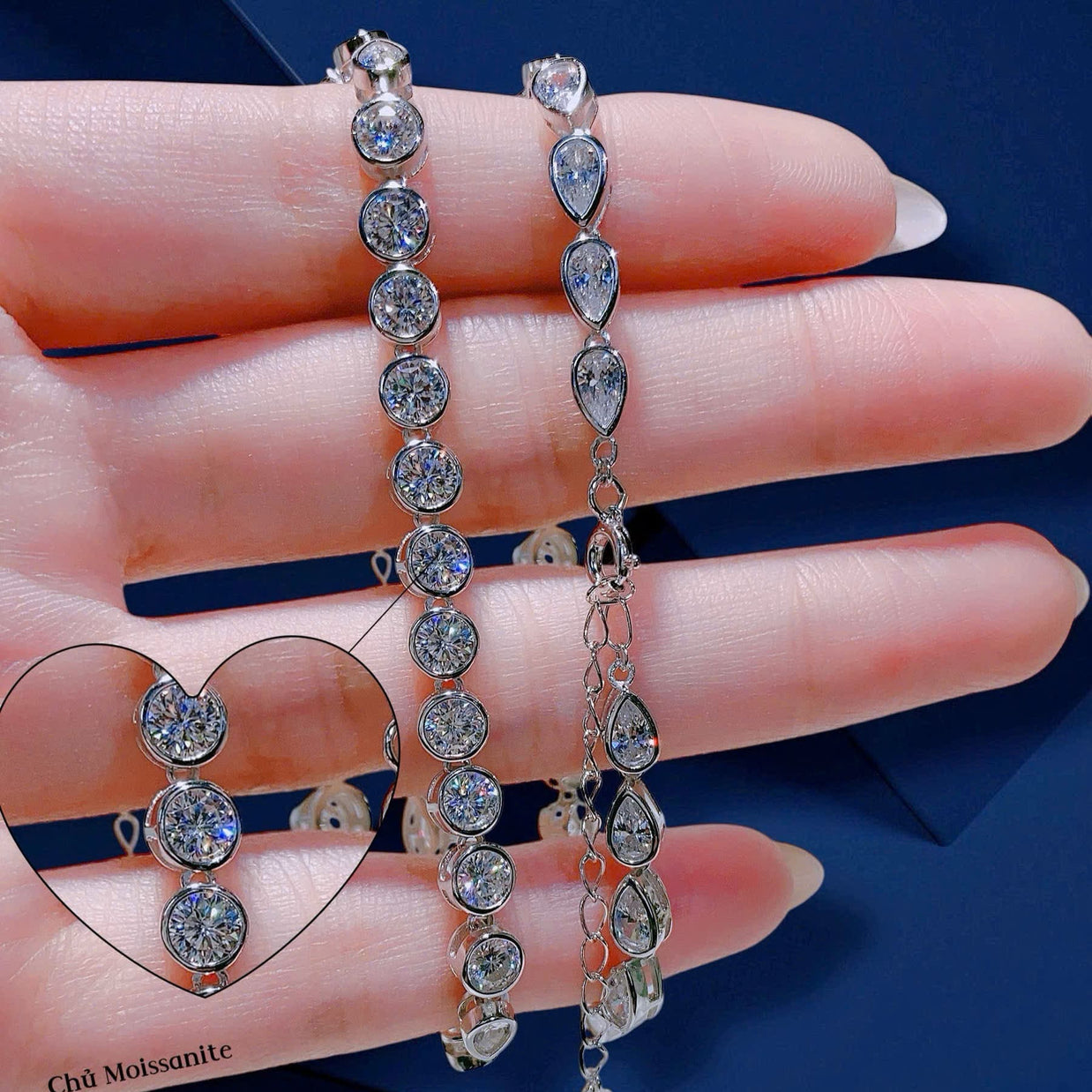 Diamond bracelet on a hand with a blue background