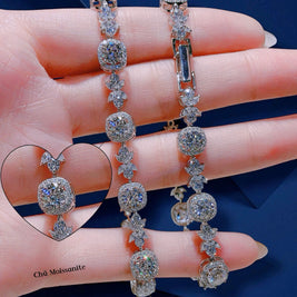 Diamond bracelet on a hand with a blue background