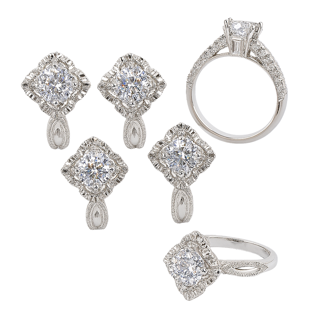 Diamond jewelry set including earrings and rings on a white background