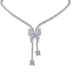 Diamond necklace with a bow-shaped pendant on a white background