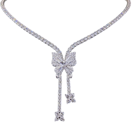 Diamond necklace with a bow-shaped pendant on a white background