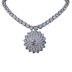 Diamond necklace with a close-up of the pendant on a white background