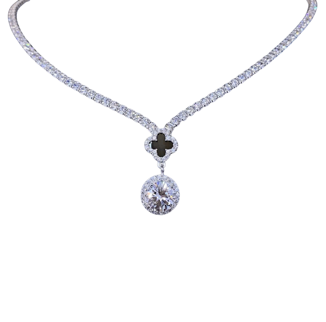 Diamond necklace with a clover-shaped pendant on a white background