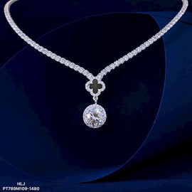 Diamond necklace with a pendant on a dark background