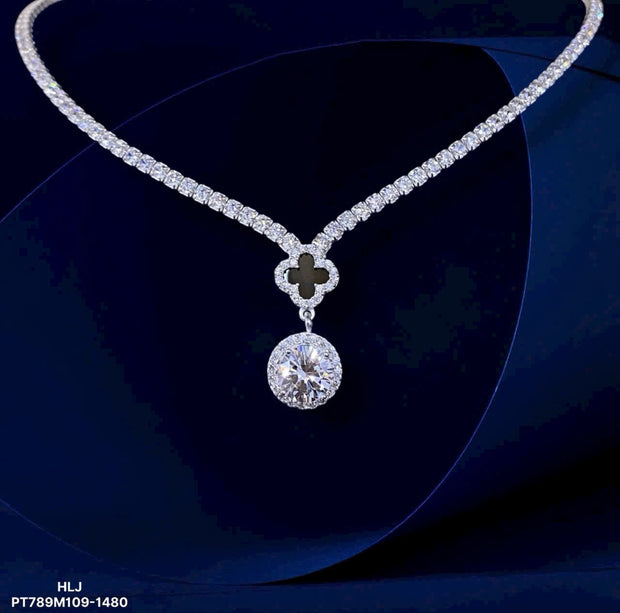 Diamond necklace with a pendant on a dark background