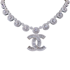 Diamond necklace with a prominent 'CC' logo on a white background