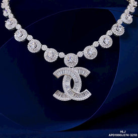 Diamond necklace with a prominent logo on a dark background