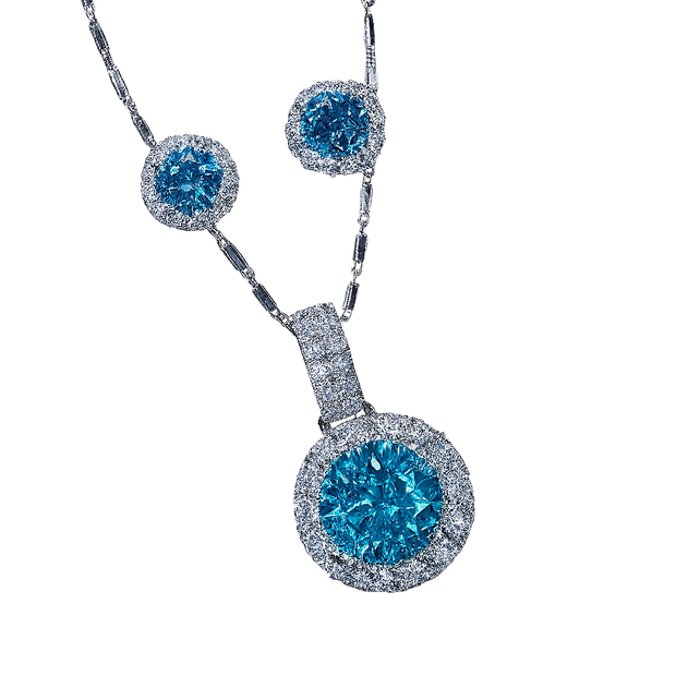 Diamond necklace with blue gemstones on a white background