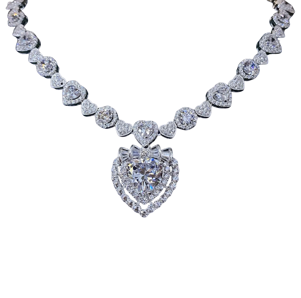 Diamond necklace with heart-shaped pendants on a white background