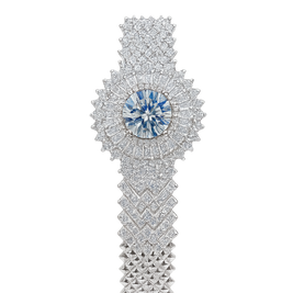 Elegant diamond bracelet with a central blue gemstone on a white background