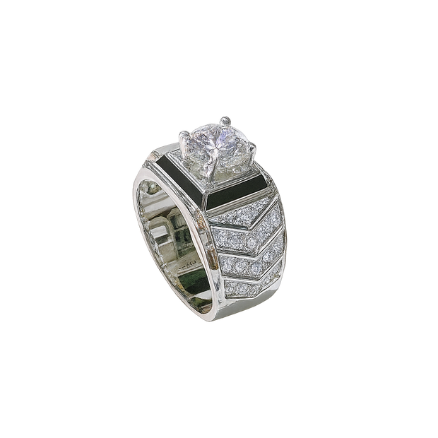 Elegant ring with diamond and black stone on a white background