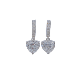 Heart-shaped diamond earrings on a white background