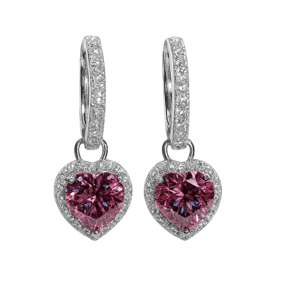Heart-shaped pink gemstone earrings with silver detailing on a white background