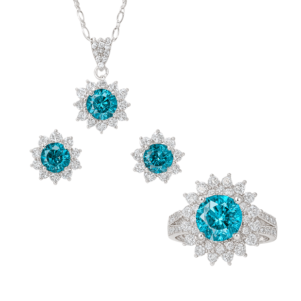 Jewelry set with blue gemstones on a white background