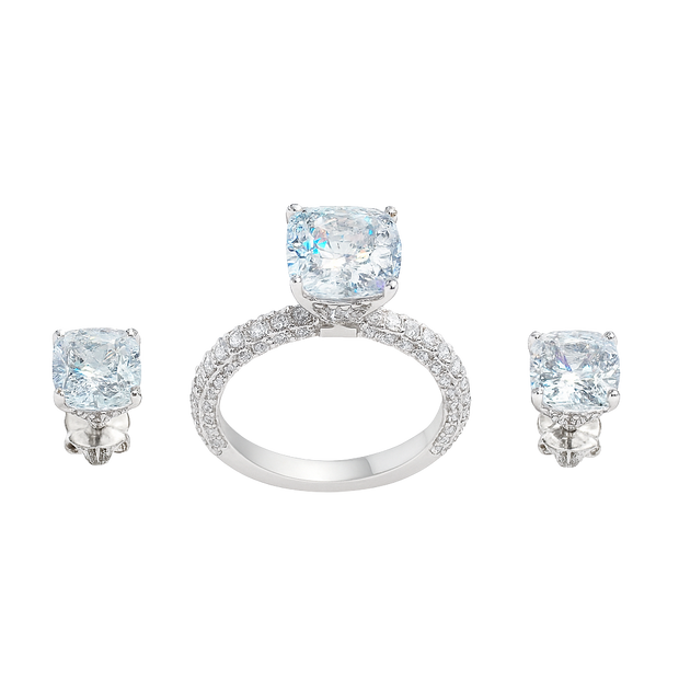 Jewelry set with ring and earrings featuring large square gemstones on a white background