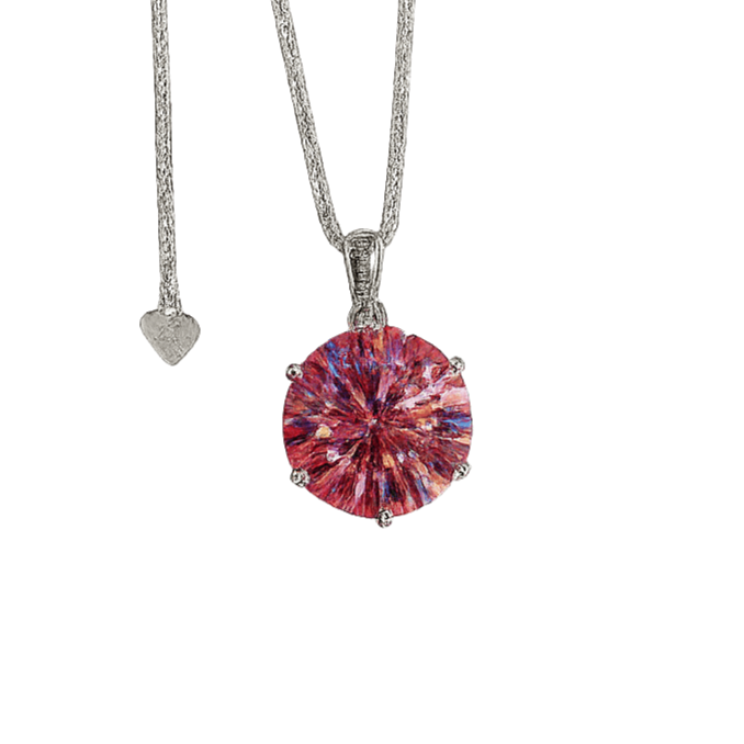 Necklace with a pink gemstone pendant on a green background