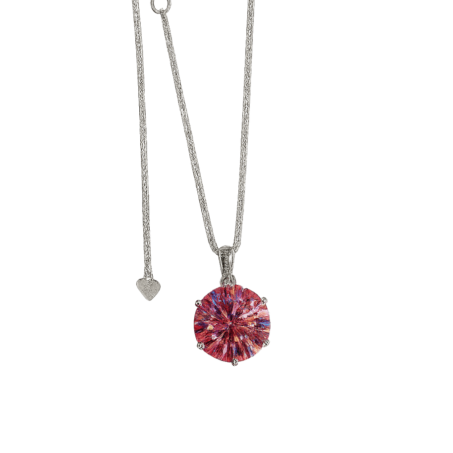 Necklace with a pink gemstone pendant on a green background
