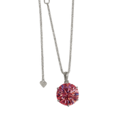 Necklace with a pink gemstone pendant on a green background
