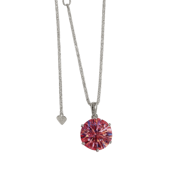 Necklace with a pink gemstone pendant on a green background