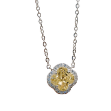 Necklace with a yellow gemstone pendant on a white background