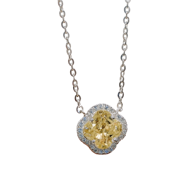 Necklace with a yellow gemstone pendant on a white background