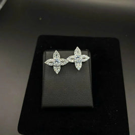 Pair of diamond earrings on a black display box
