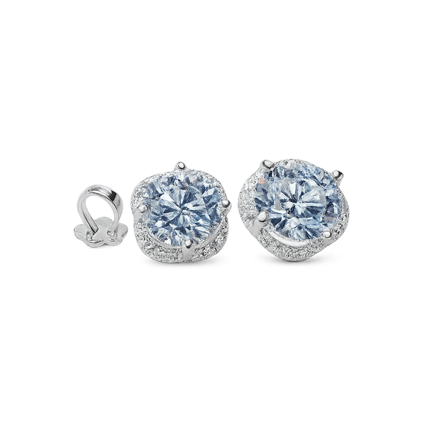 Pair of diamond earrings on a white background