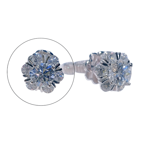 Pair of diamond stud earrings on a white background