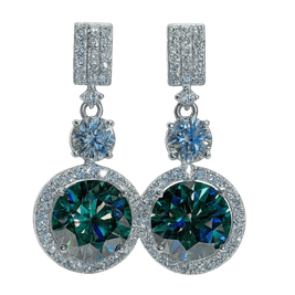 Pair of earrings with green gemstones and silver accents on a white background