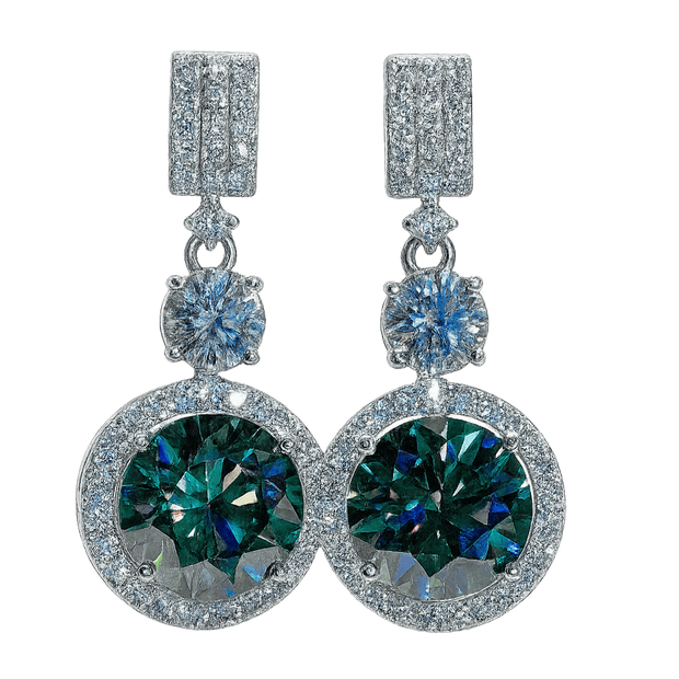 Pair of earrings with green gemstones and silver accents on a white background