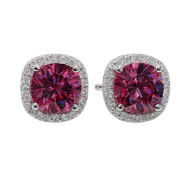 Pair of earrings with pink gemstones and silver accents on a white background