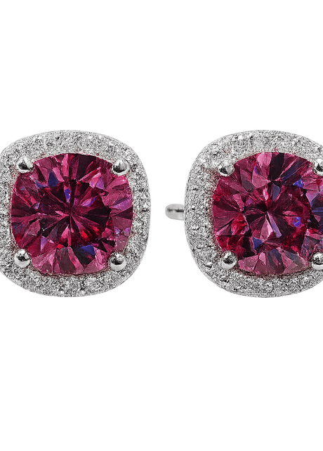 Pair of earrings with pink gemstones and silver accents on a white background