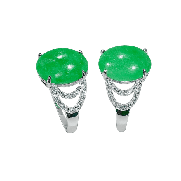 Pair of green gemstone rings with silver bands on a transparent background