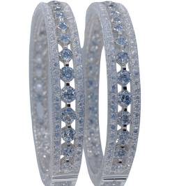 Pair of hoop earrings with blue gemstones on a white background