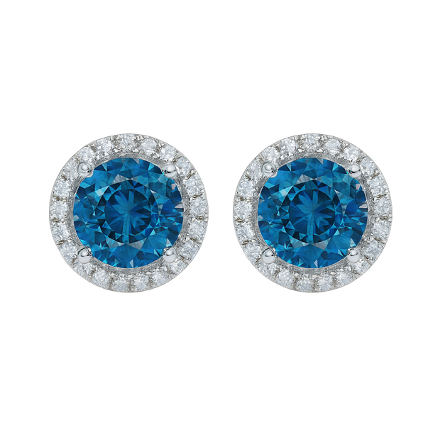 Pair of round blue gemstone earrings with diamond accents on a white background
