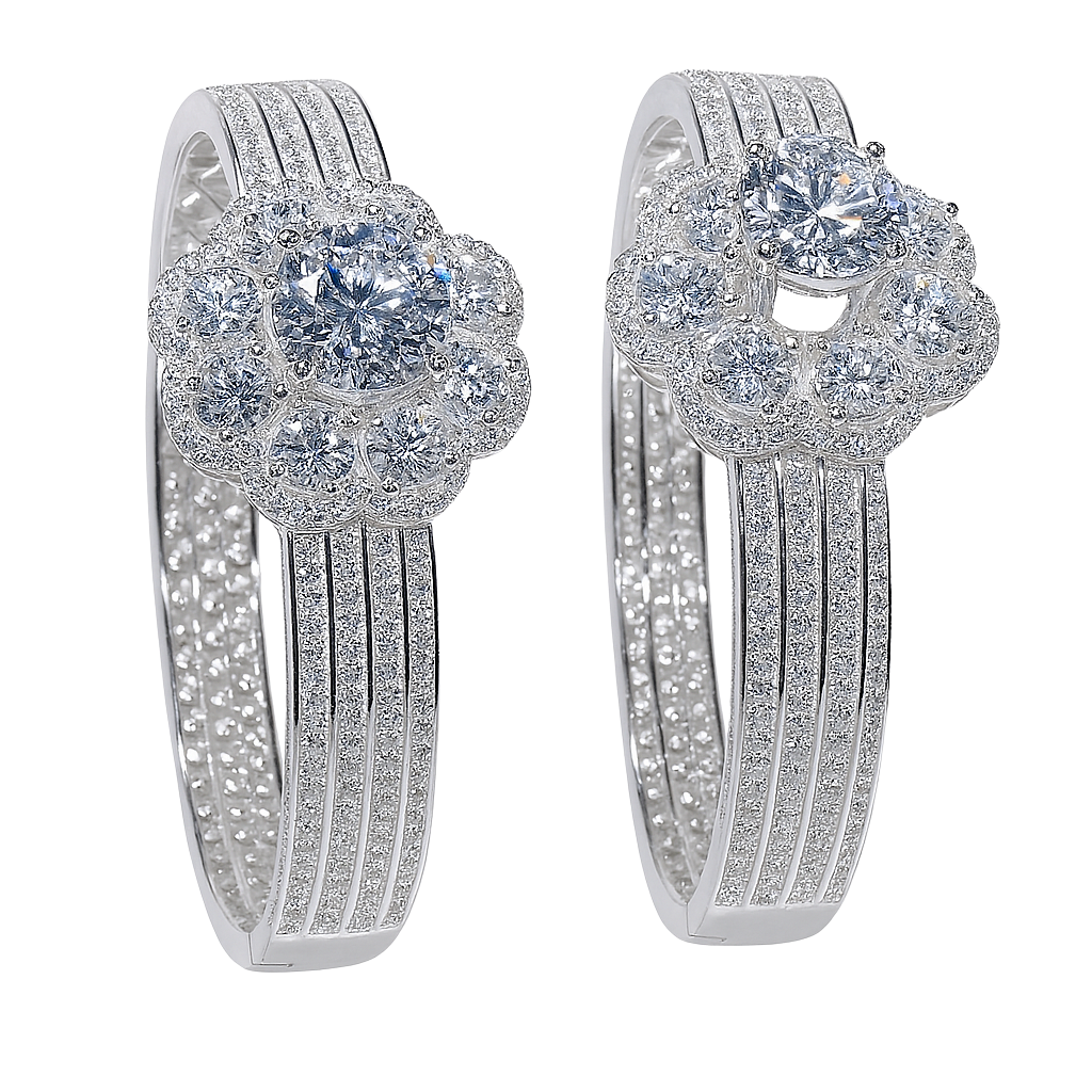 Pair of silver earrings with gemstones on a white background