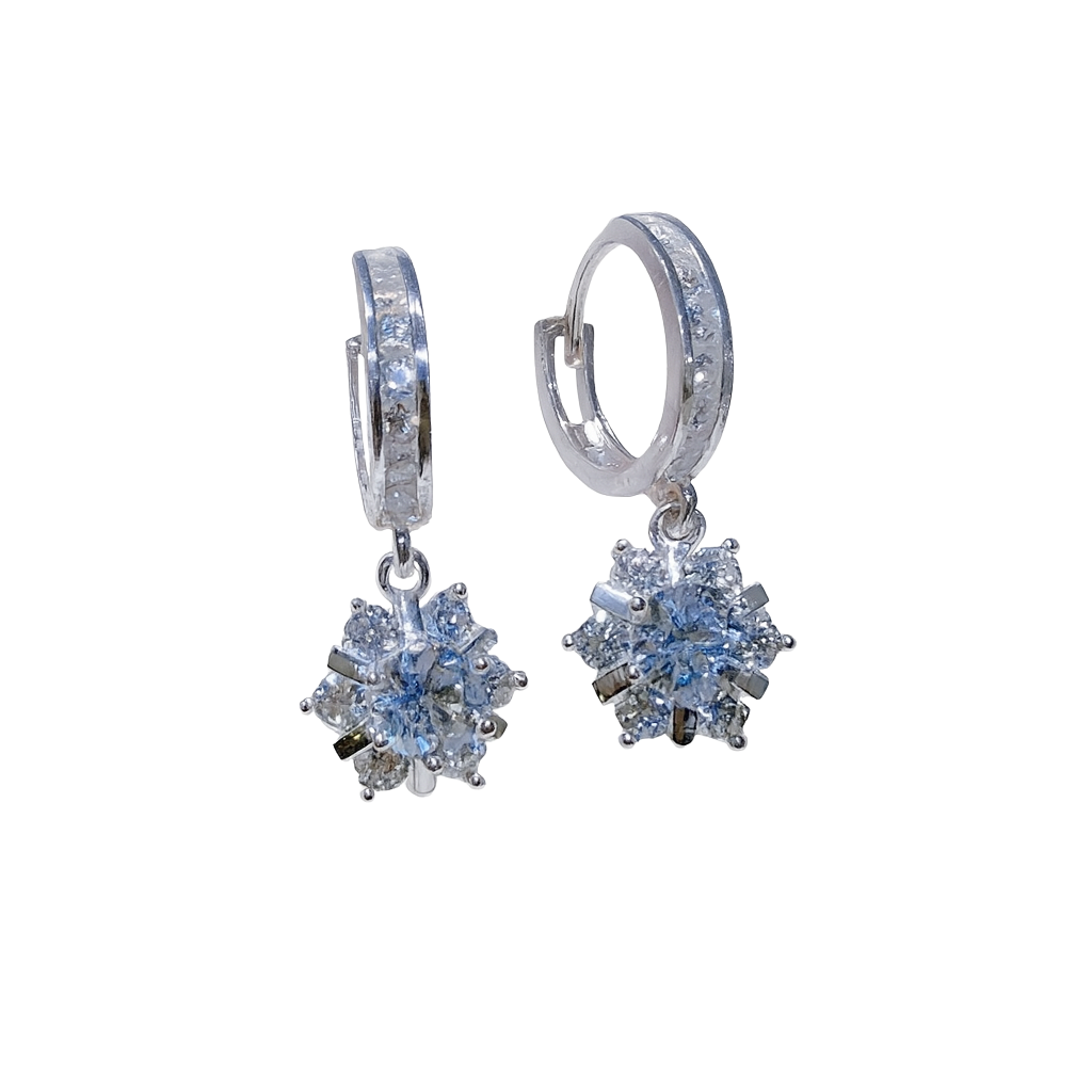 Pair of silver earrings with clear gemstones on a white background