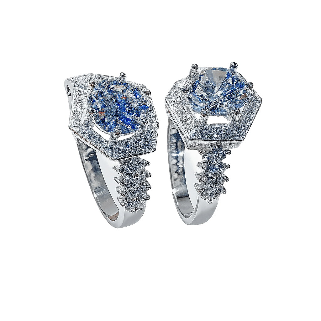 Pair of silver rings with blue gemstones on a transparent background