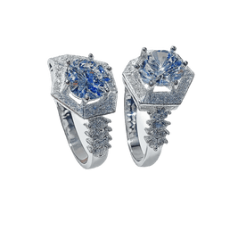 Pair of silver rings with blue gemstones on a transparent background