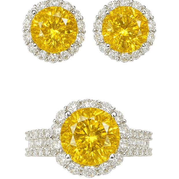 Pair of yellow gemstone earrings with silver halo on a white background