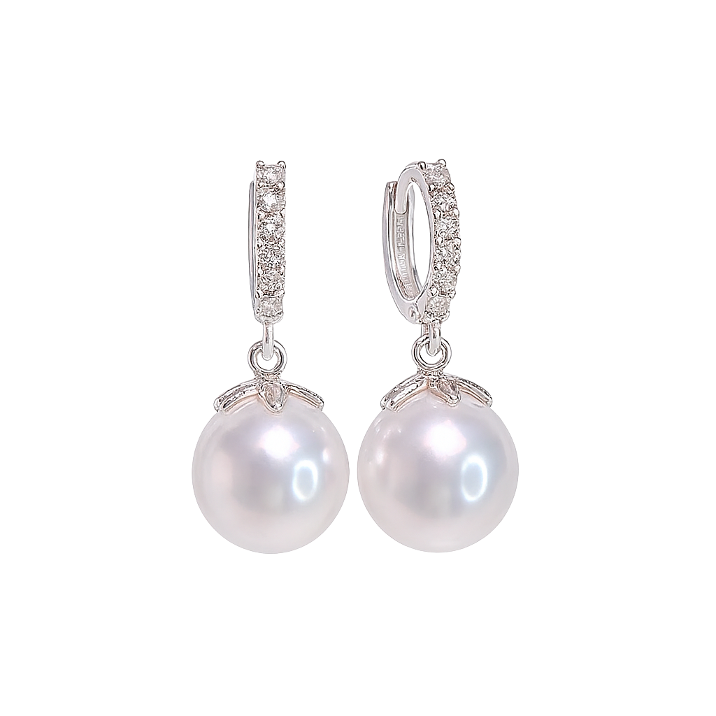 Pearl earrings with silver clasps on a white background