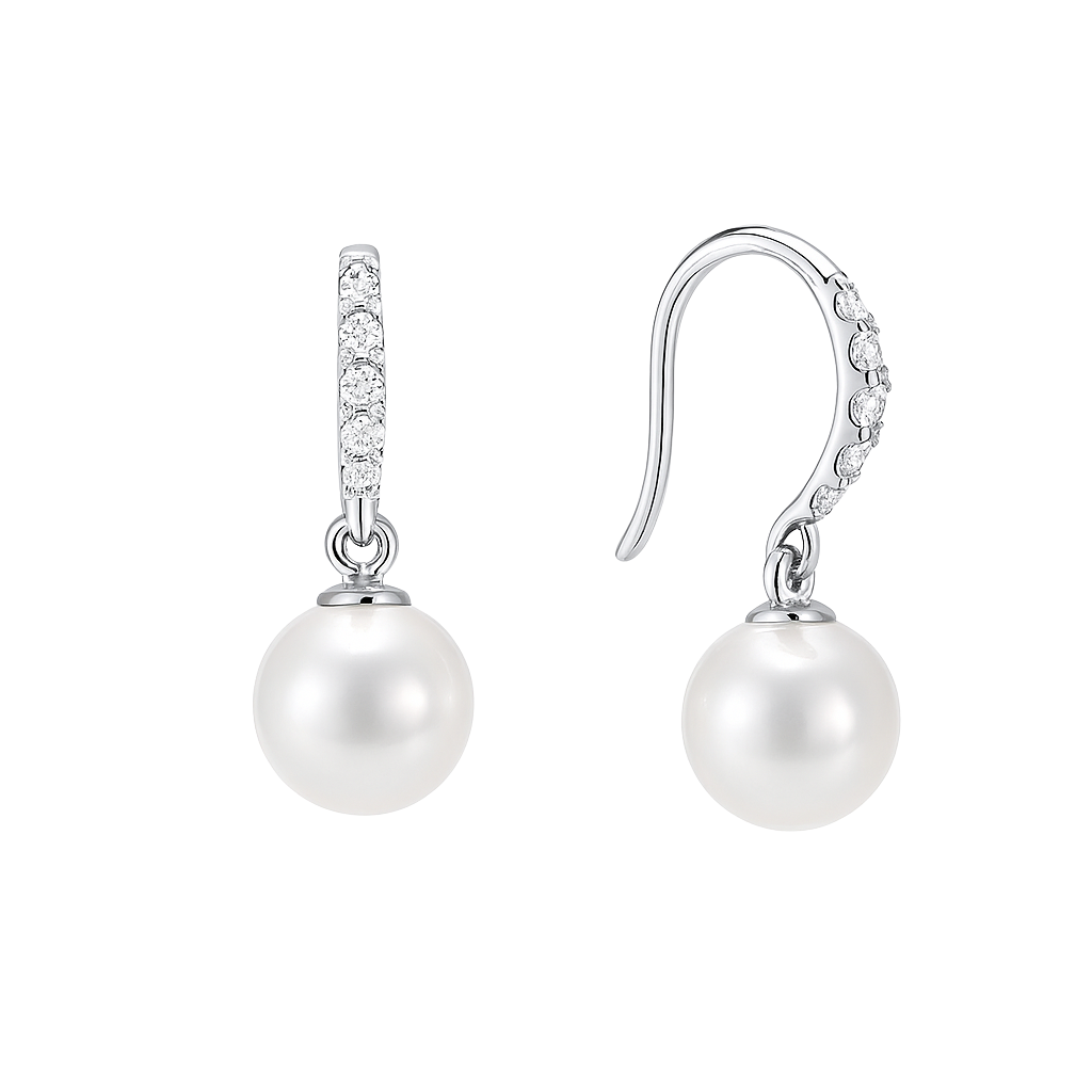 Pearl earrings with silver hooks and clear gemstones on a white background
