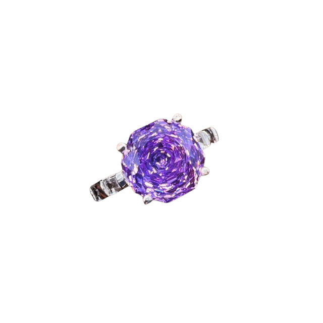 Purple rose-shaped object on a white background