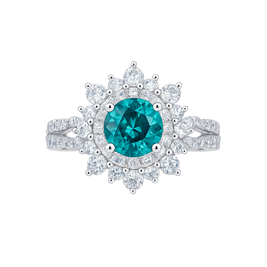 Ring with a central blue gemstone and diamond-studded halo on a white background