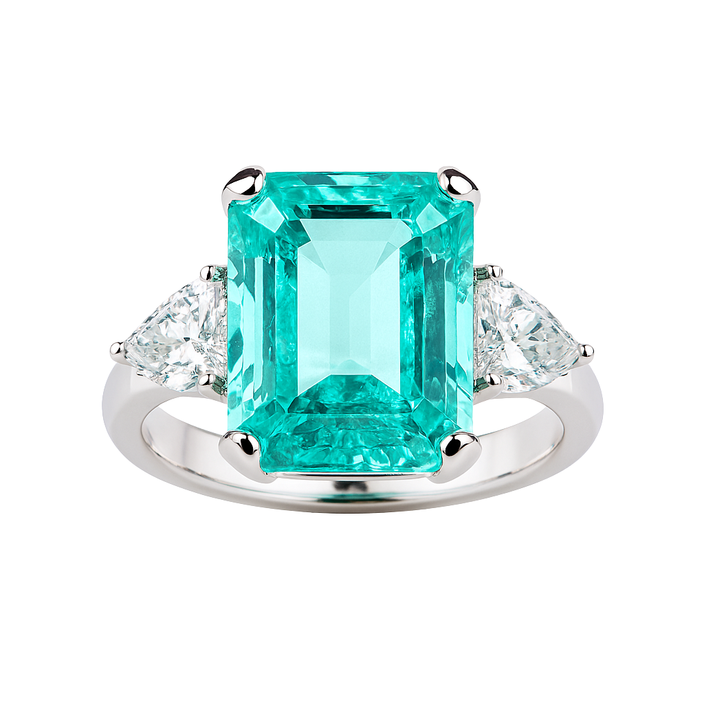 Ring with a large emerald-cut green gemstone and smaller clear stones on a white background