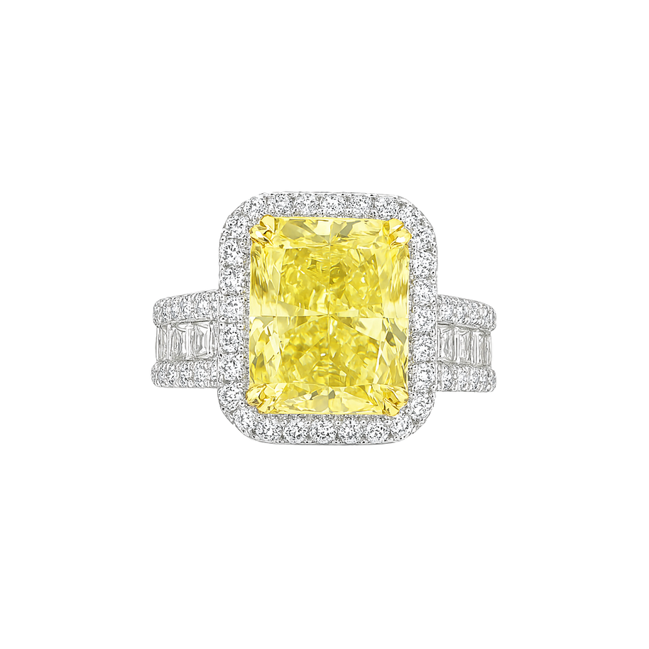Ring with a yellow diamond and white gemstones on a white background